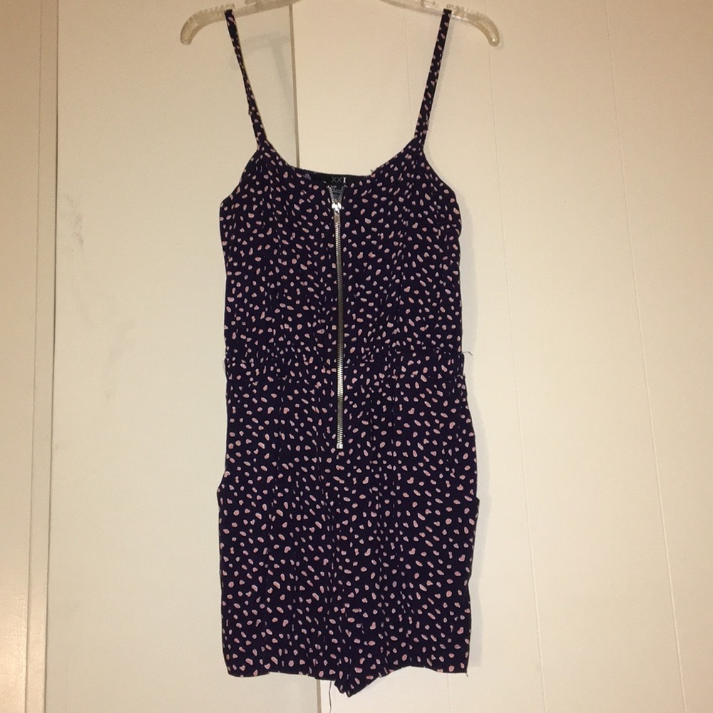 Size small romper. never worn. good condition.